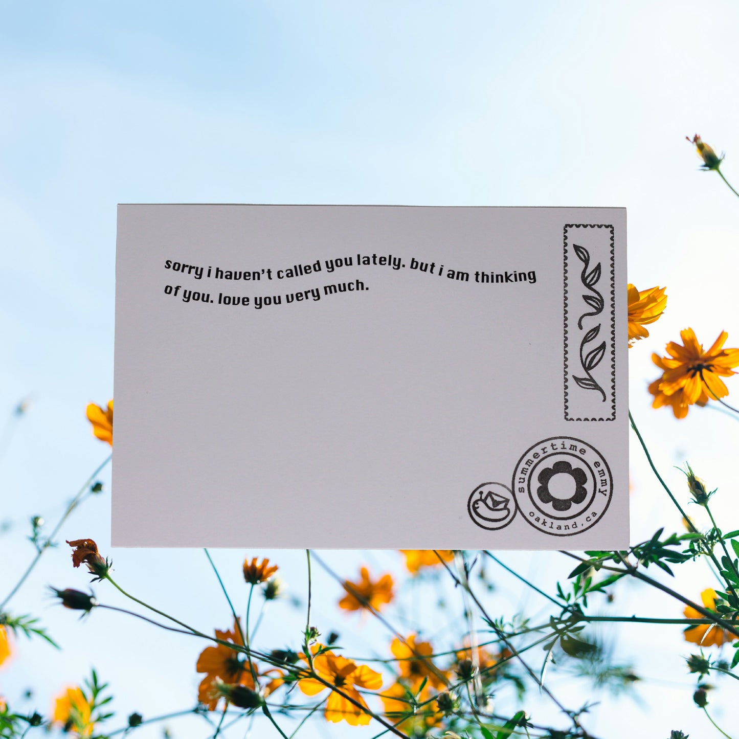 Postcard reading: "sorry i haven't called you lately. but i am thinking of you. love you very much."